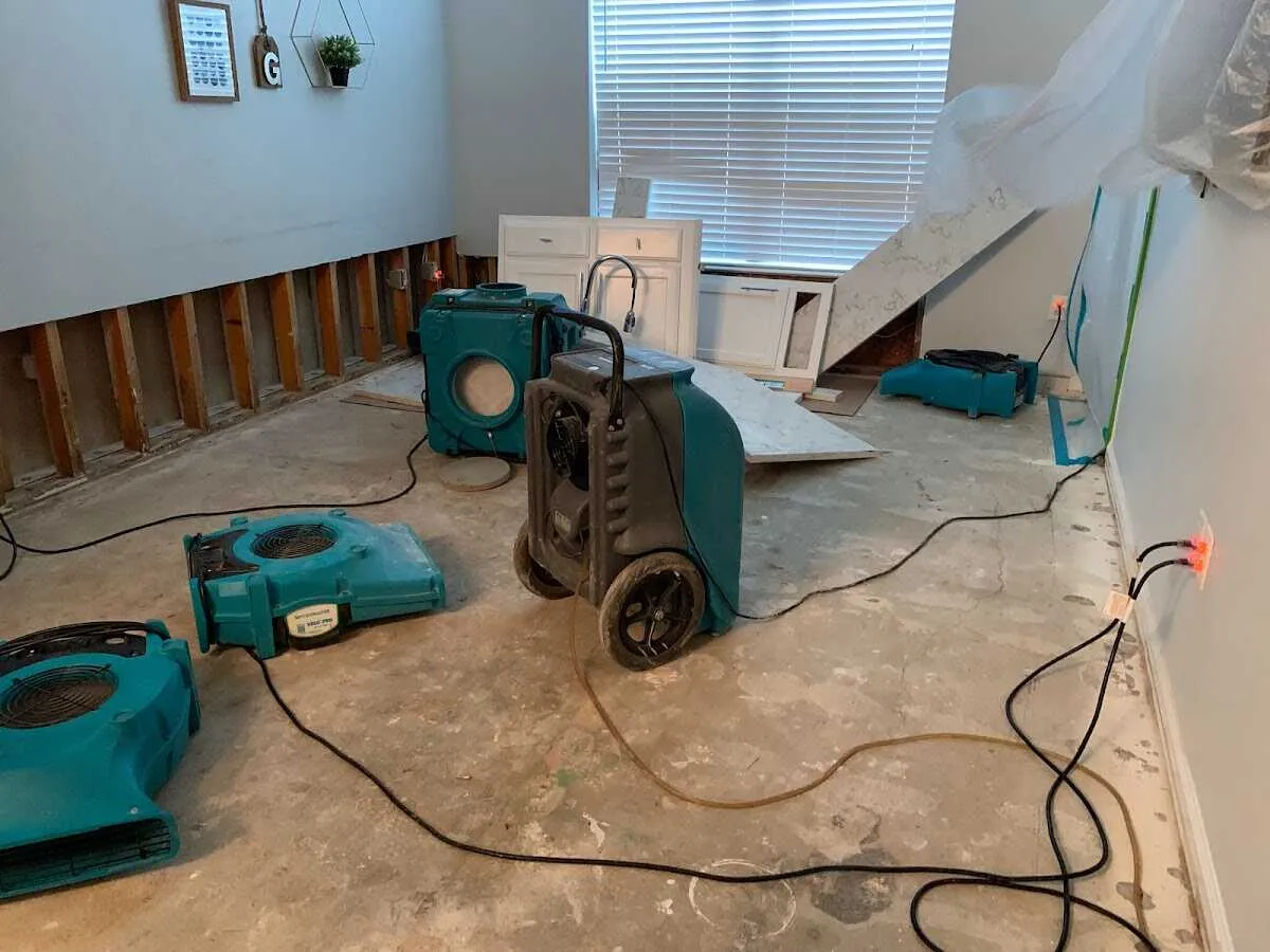 Dehumidifier in flood-cut room for Water Damage Restoration in Leawood